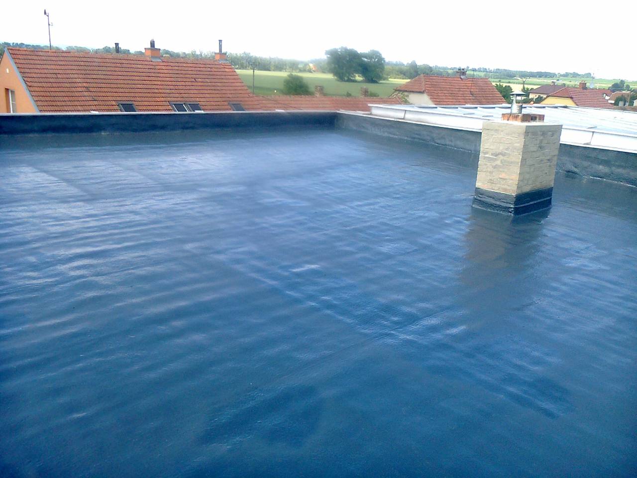 Tepelná izolace a hydroizolace ploché střechy Ladná